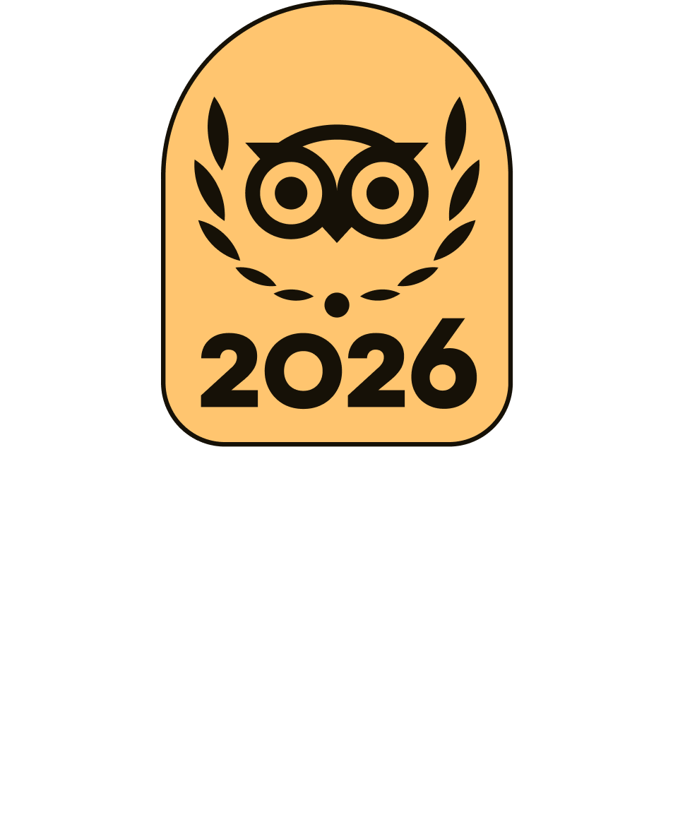 Stylized owl within laurel, above '2026' on peach background.